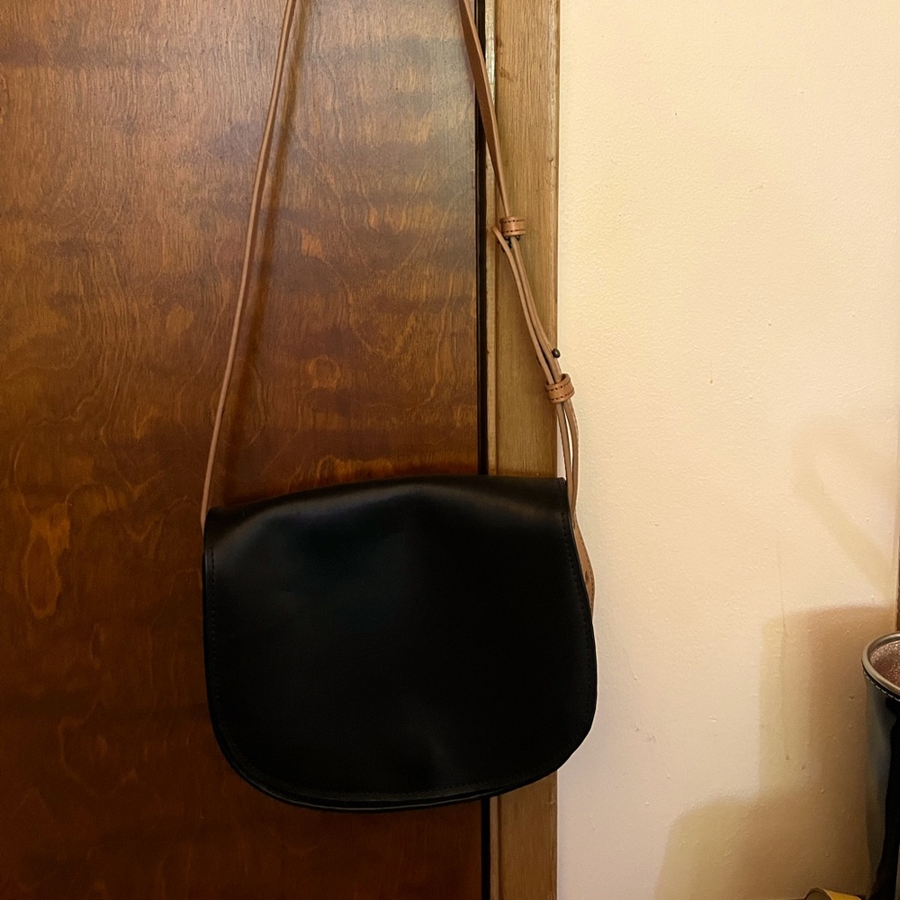 LL Bean Black and Tan saddlebag style shoulder bag.